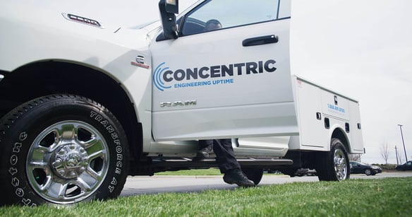Concentric truck with door open showing logo