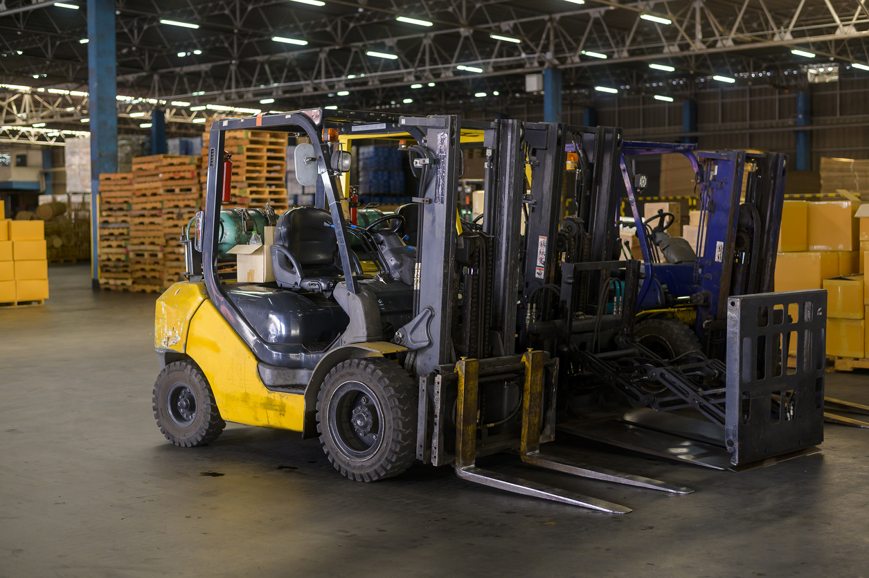forklifts in warehouse